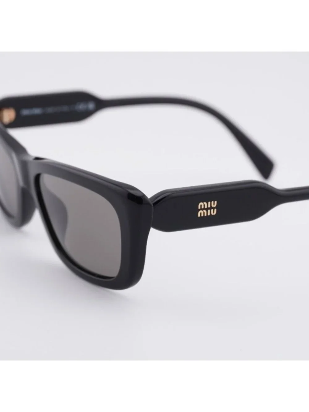 Miu Miu MU B12S 16K80Q Sunglasses Glossy Black Rectangle Frame, Dark Grey Lenses